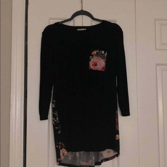 First Looks Tops - Women’s black and flower blouse. Super cute!